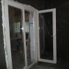 Двухстворчатая деревянная дверь из сосны изготовлена с нестандартным нижним брусом