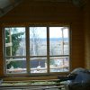 Балконная группа с дверью-порталом. Фурнитура портального типа позволяет откидывать и отодвигать дверь вдоль глухой части. Отделка белёный лак. Частный дом. Владимирская область. Поселок Киржач.